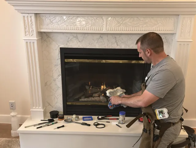 Plainfield Chimney Sweep performing fireplace maintenance in Plainfield, CT
